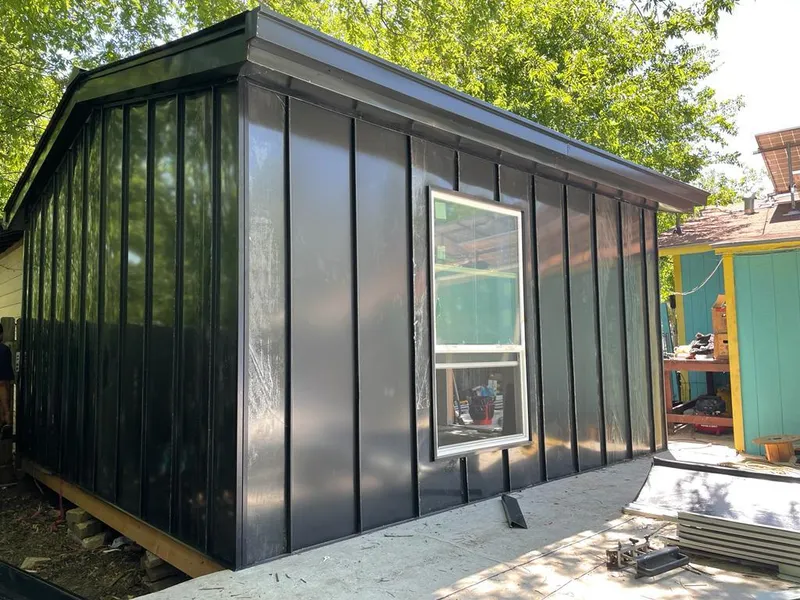 Black standing seam metal wall panels for Metal Roof Installation in West Allis